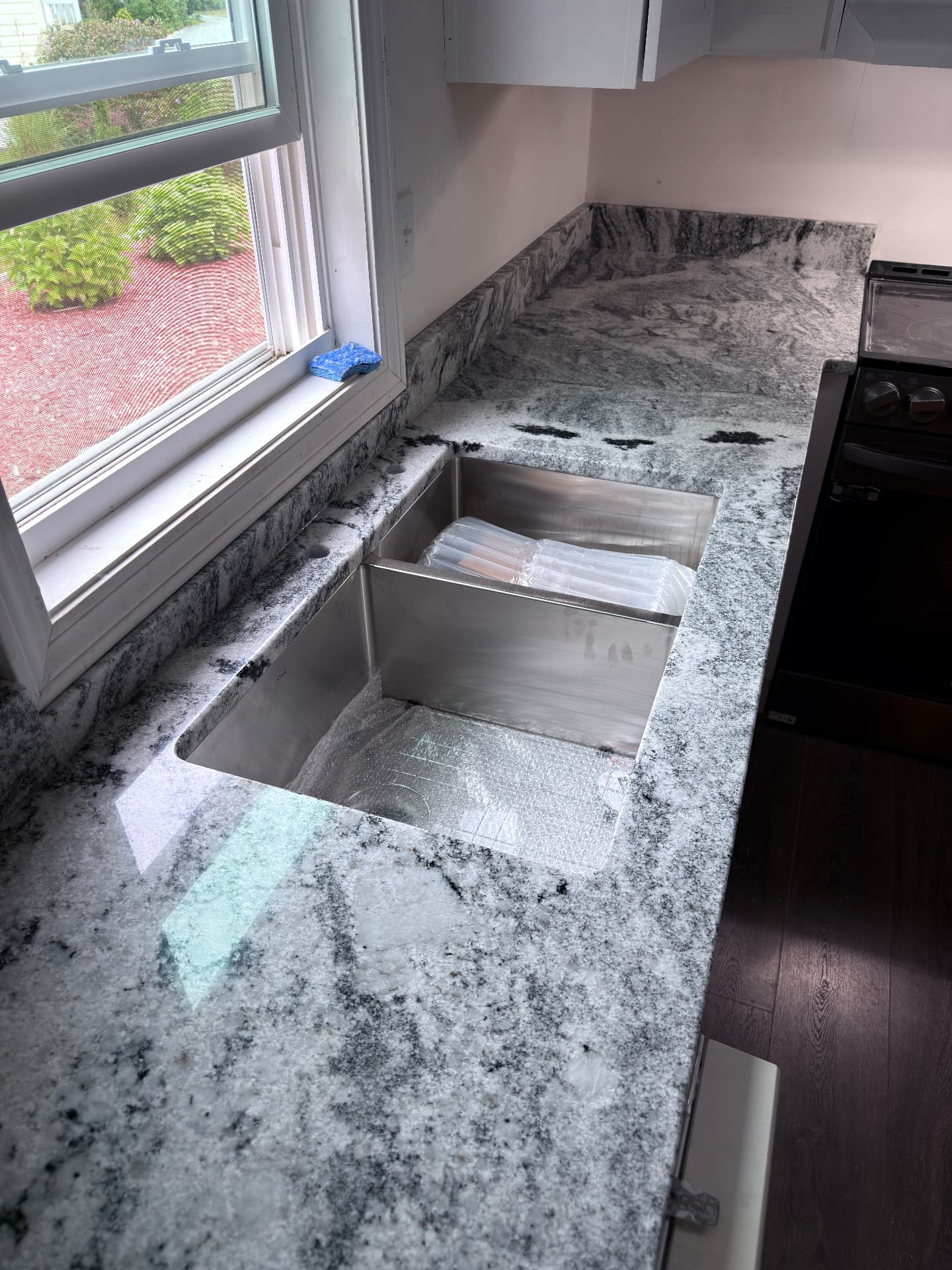 Granite countertop with double undermount sink